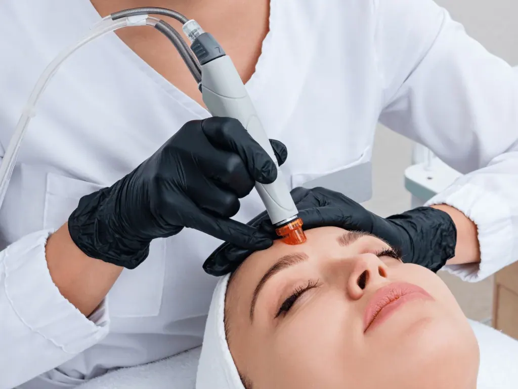 Facial treatment using a handheld device
