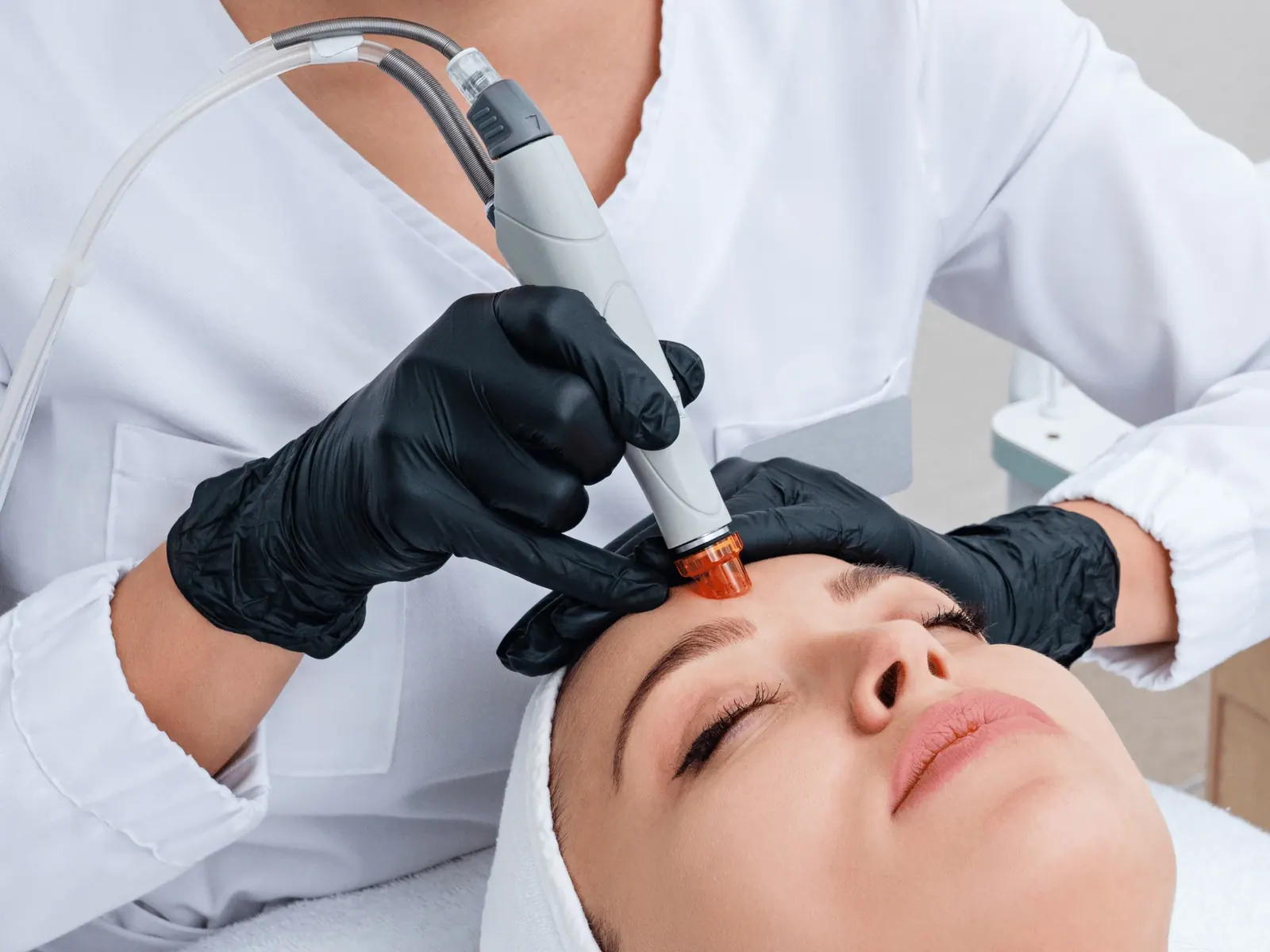 Facial treatment using a handheld device