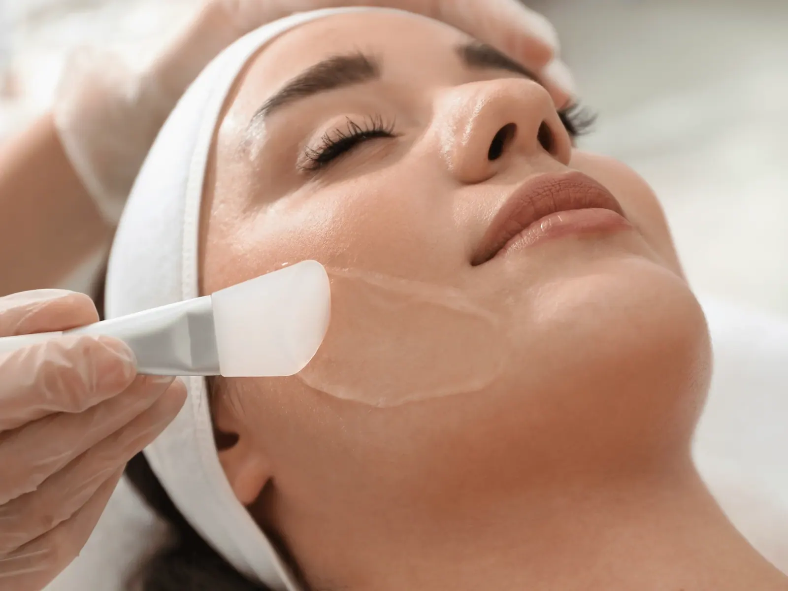 Facial treatment using a brush